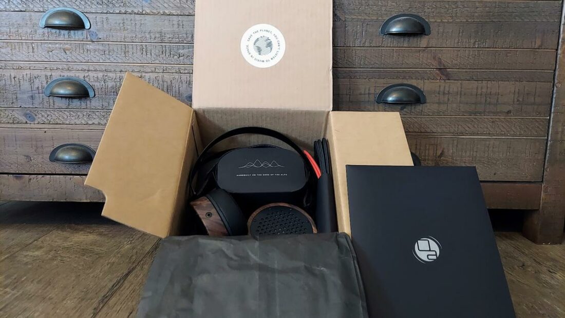 The paper box that holds the cable also helps the headphones stay in shape in the box.
