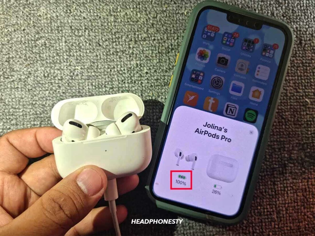Charging Icon beside the AirPods Battery.