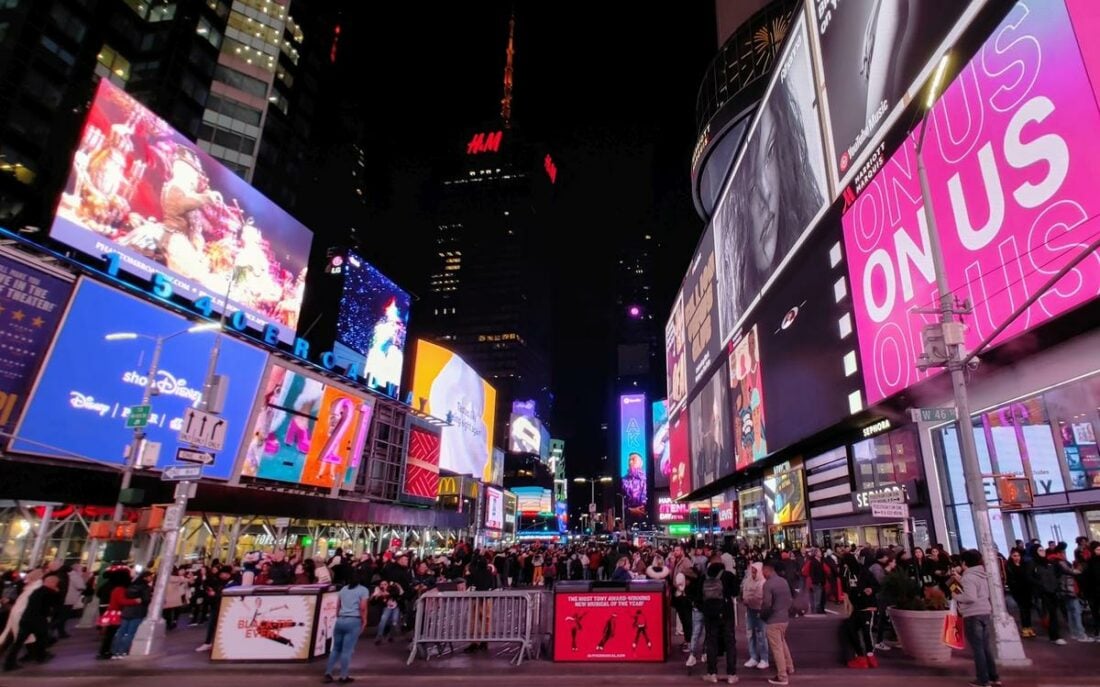 At night, Times Square remains a mega-attraction for tourists.