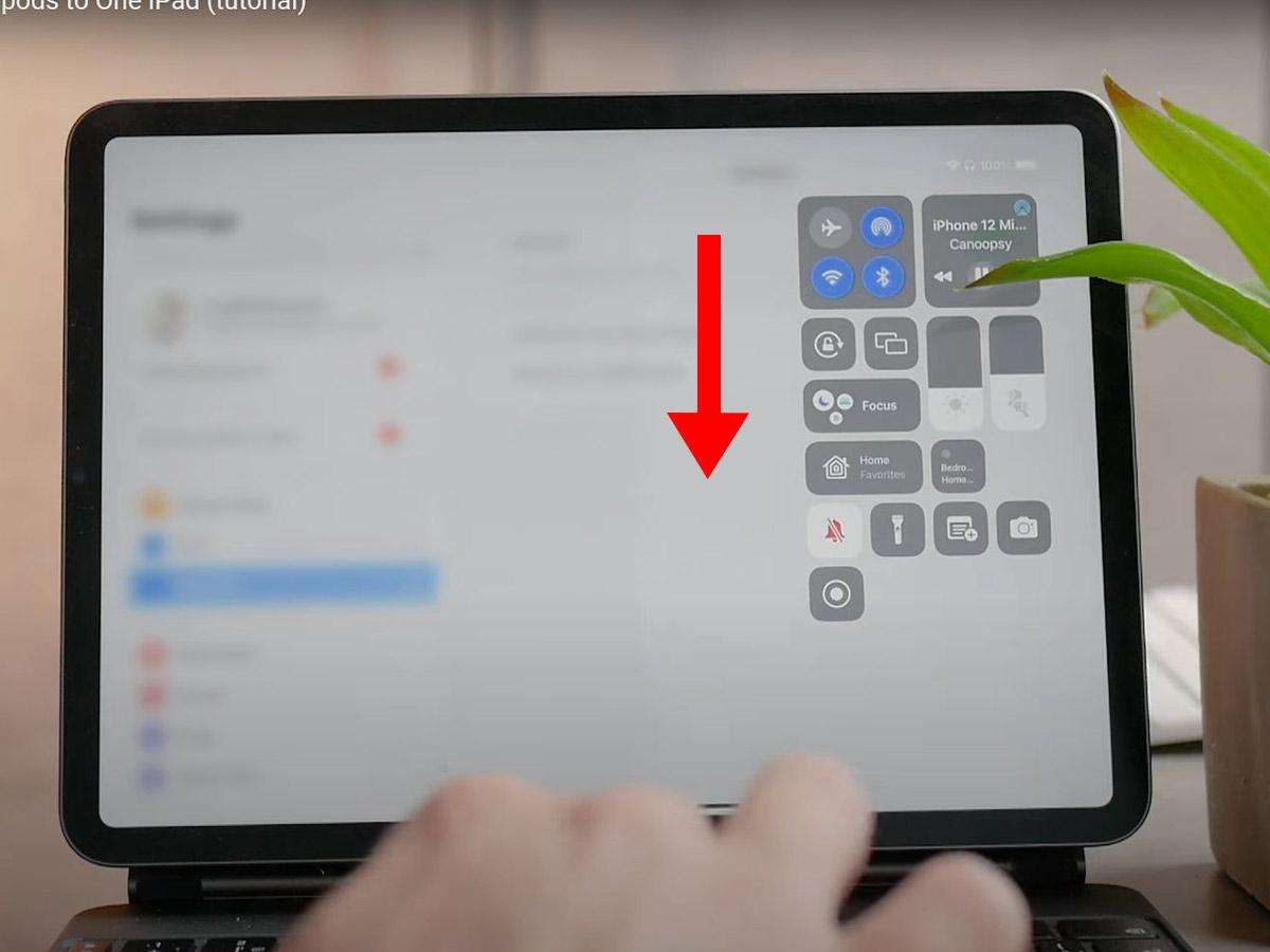 Open Control Center from your iPad by swiping down from the top right corner of the screen. (From: Youtube/Foxtecc)