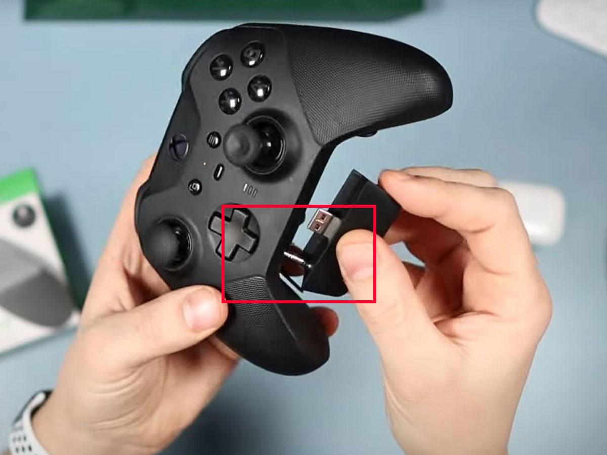 Plug the 3.5mm plug into the audio jack on your Xbox controller. (From: Youtube/CTA - tech desk)