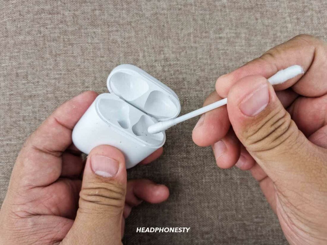 Use cotton swab to clean the AirPods' charging case pin.