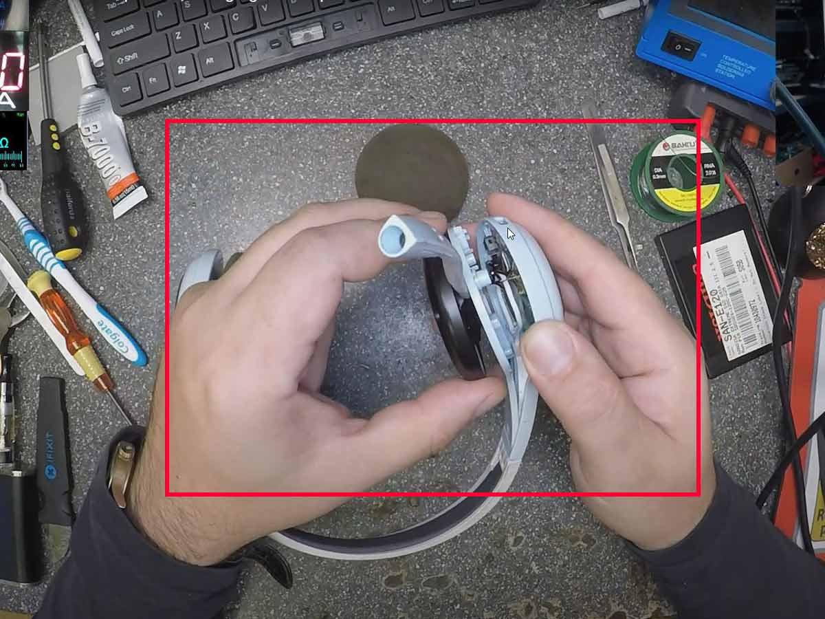 Put the microphone to the side to avoid damaging it. (From: Youtube/Electronics Repair School)