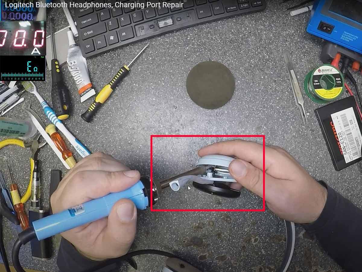 Solder the charging pins. (From: Youtube/Electronics Repair School)