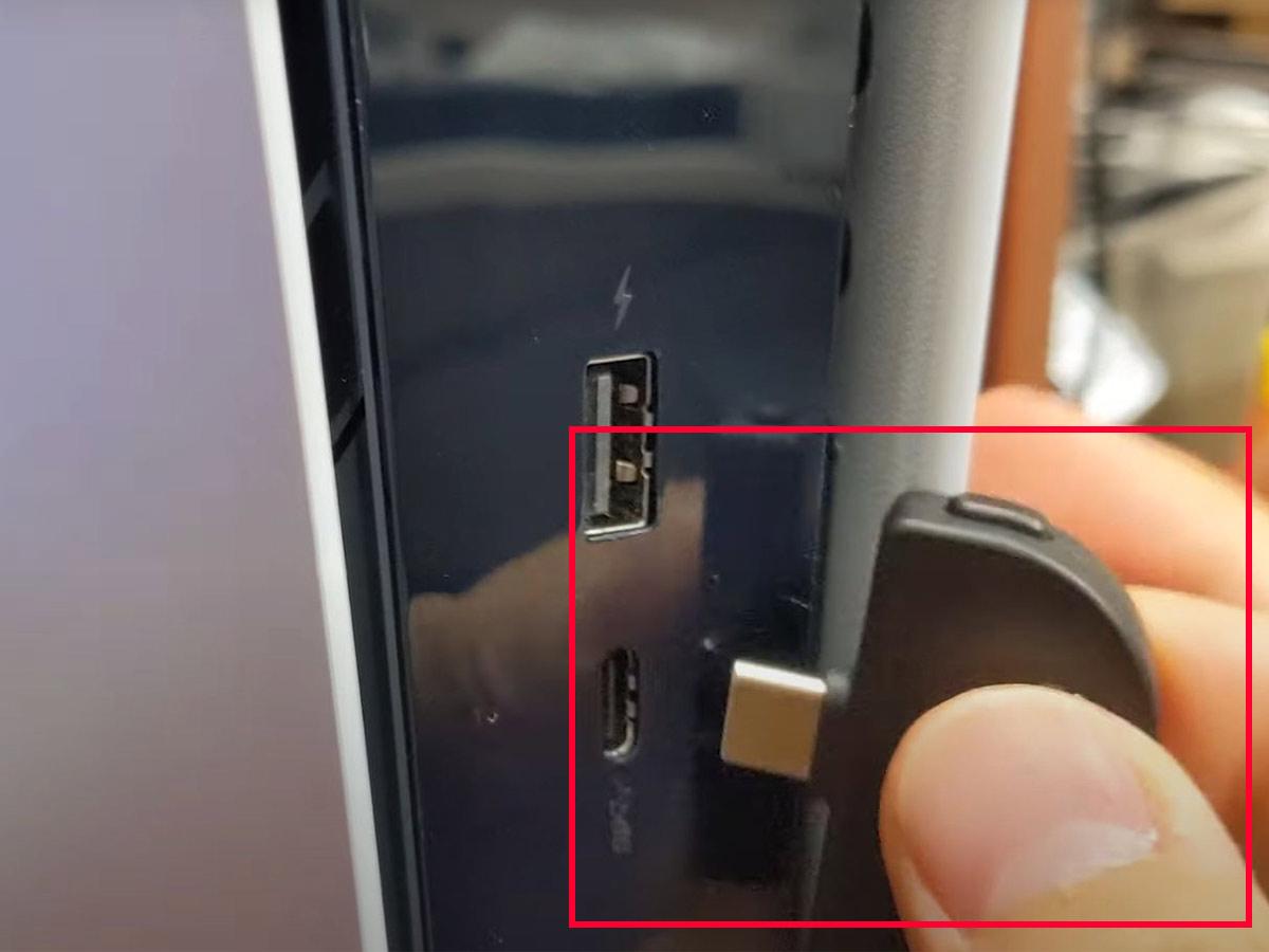 Insert the adapter into the appropriate USB port on your console. (From: YouTube/Avantree)