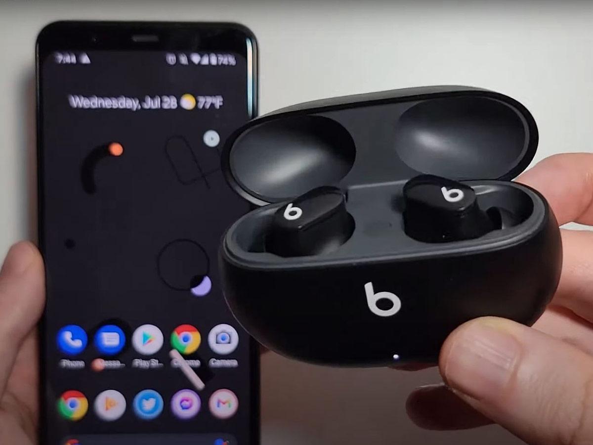 Beats Studio Buds beside an Android device. (From: Youtube/Tech Tips)