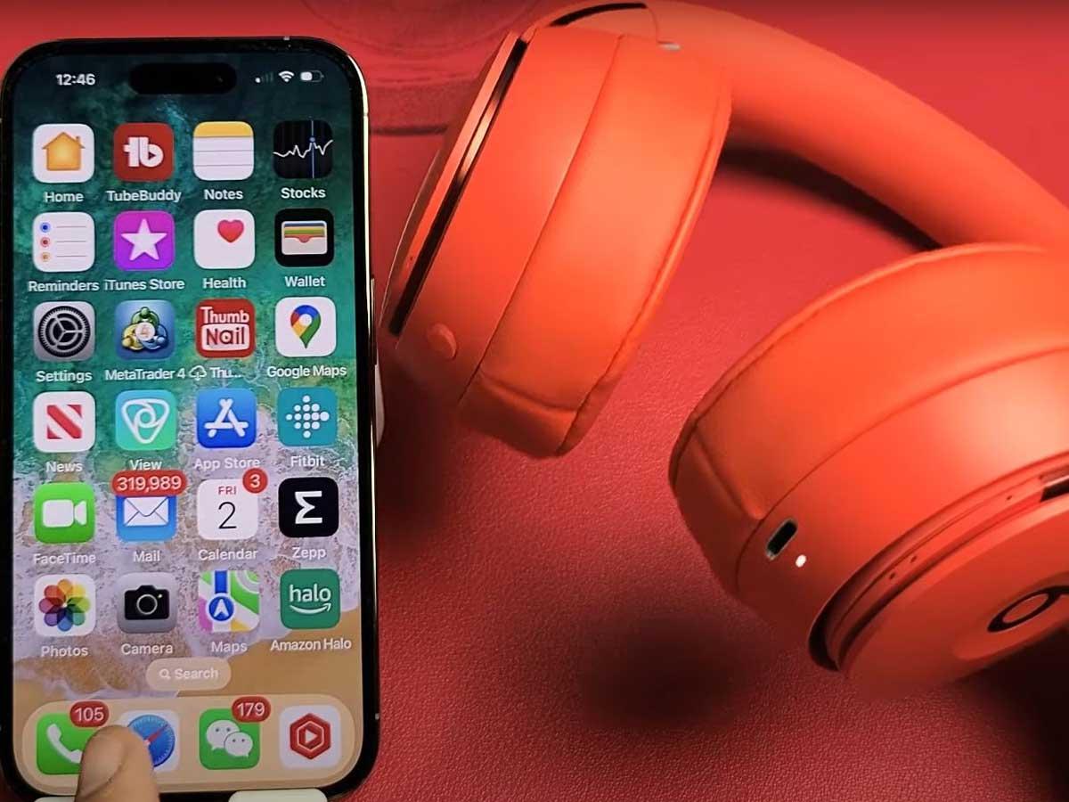 Beats headphones placed near to an iPhone. (From: Youtube/WorldofTech)