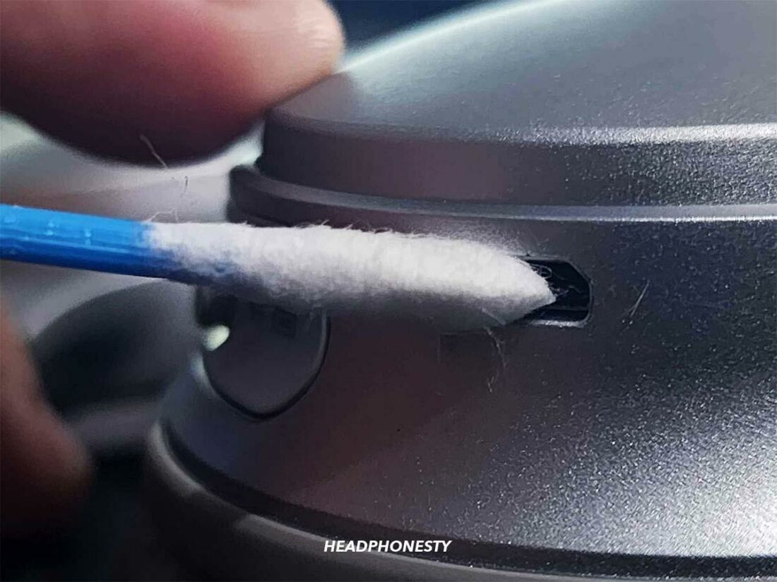 Clean the inside of the charging port with a cotton swab.
