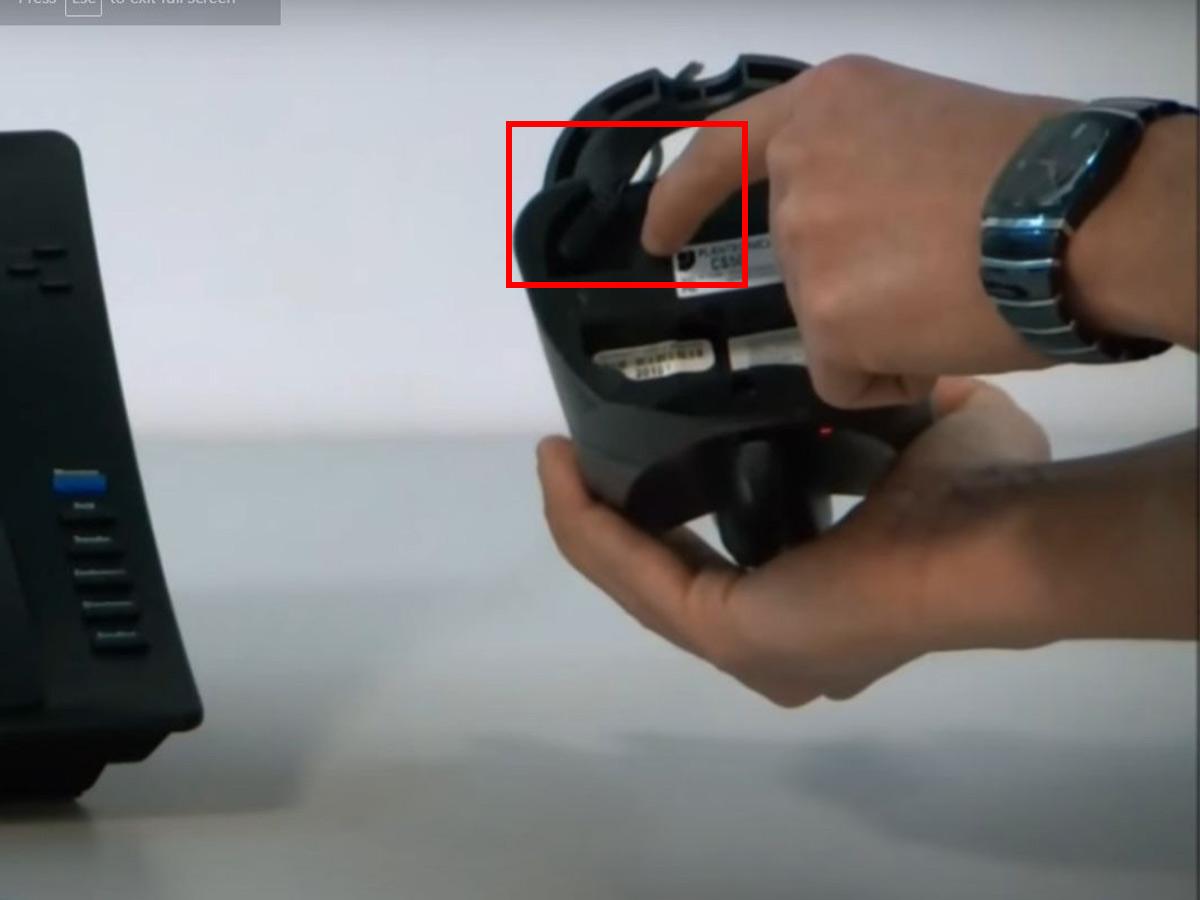 Plug the AC power to the charging base. (From: Youtube/Refurbished Phone Exchange)