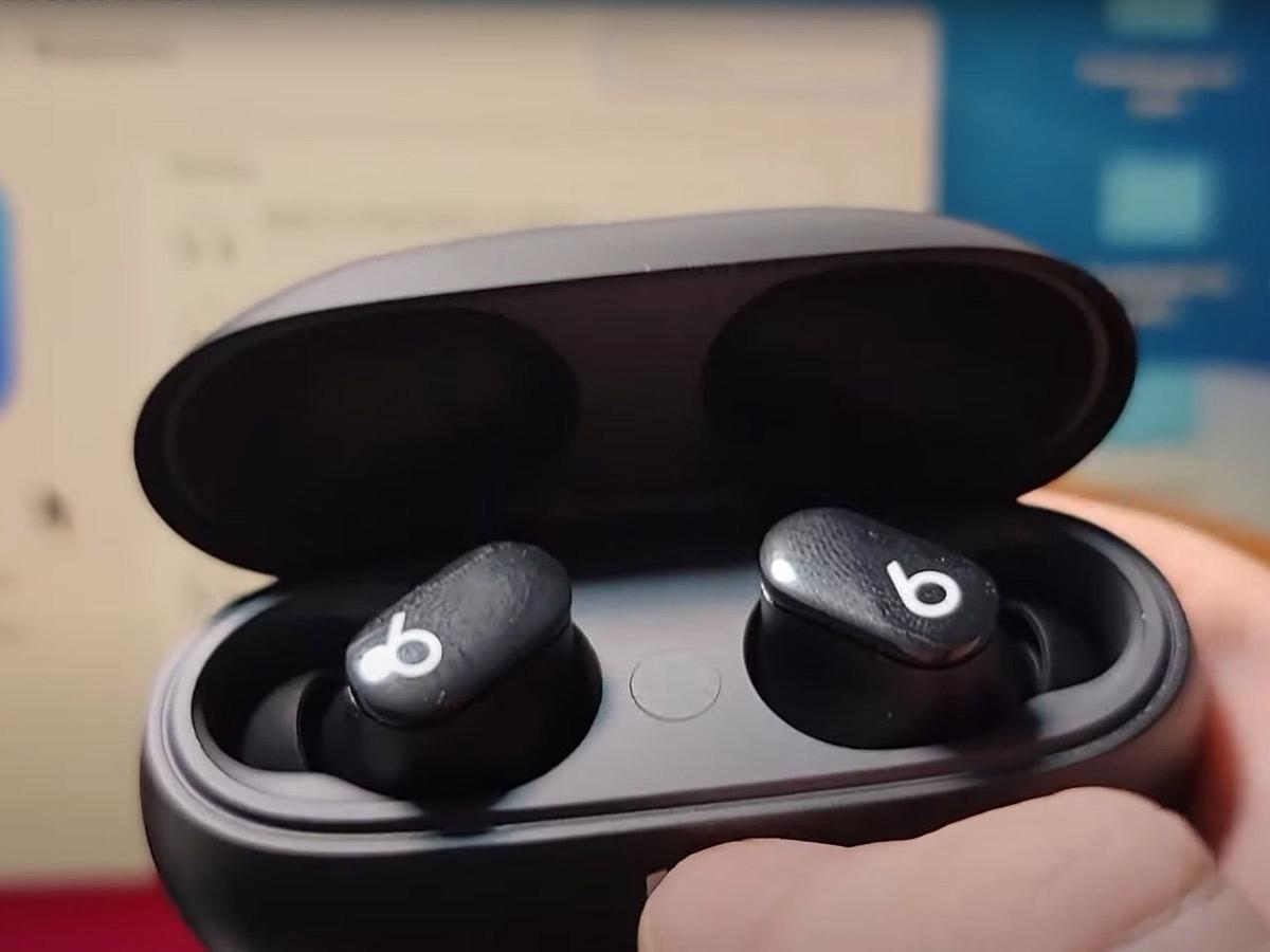 Place your Beats Studio Buds inside the charging case with the lid open. (From: Youtube/Tech Tips)