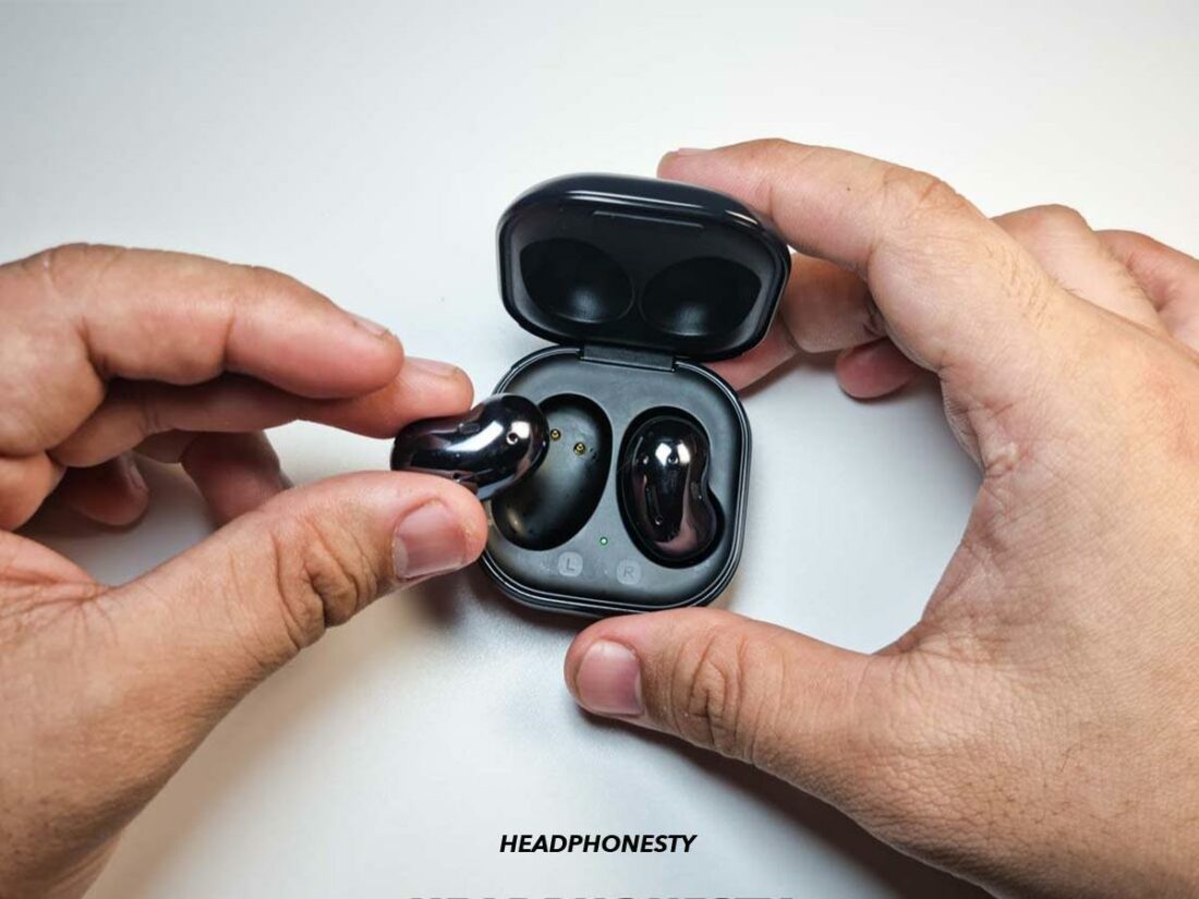 Remove your earbuds from the case.