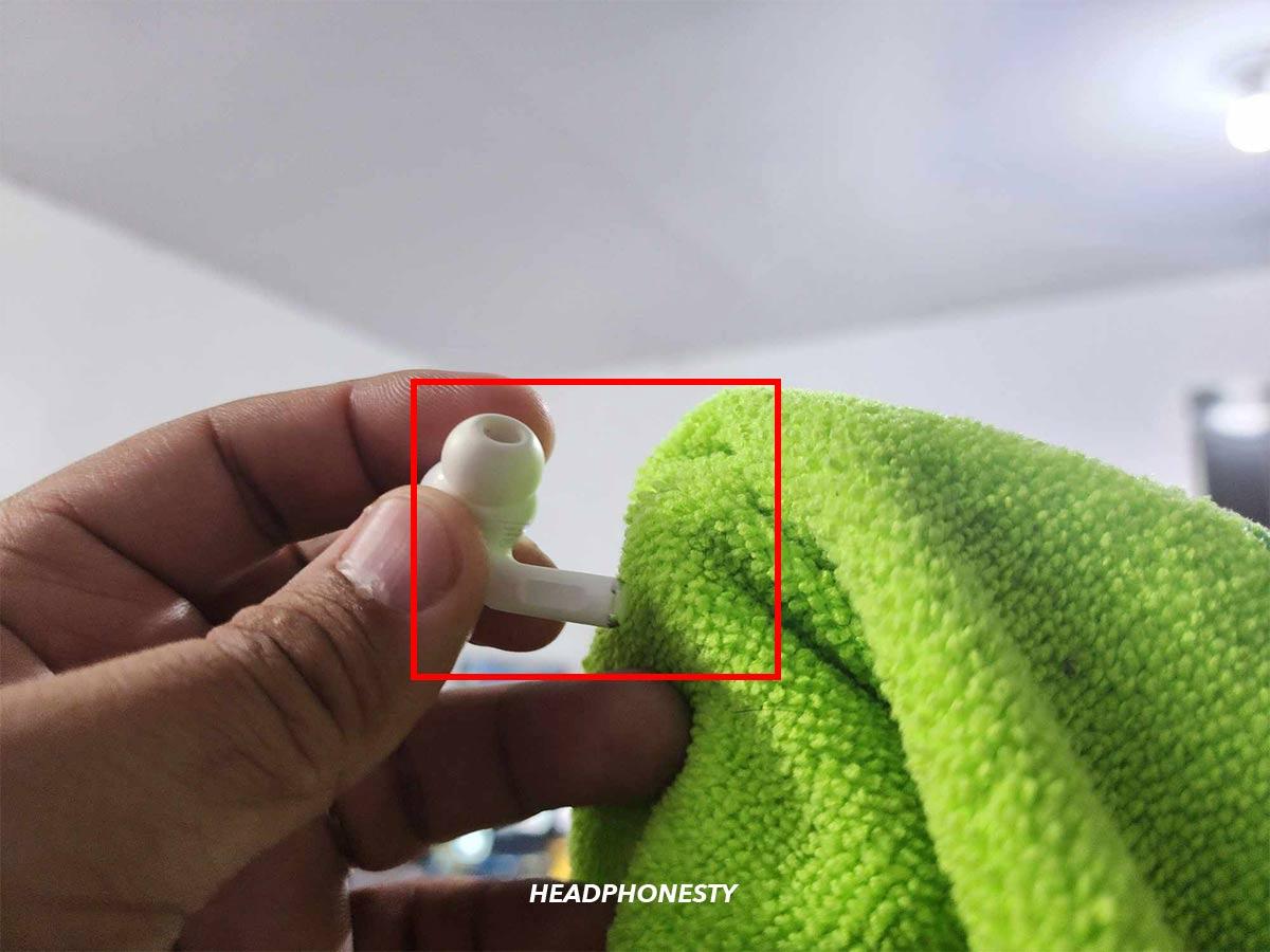 Wipe the AirPods’ stems with a lint-free cloth.