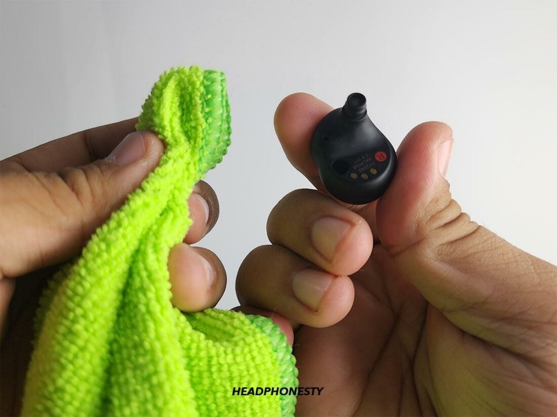 Wipe earbuds dry with a lint-free cloth.