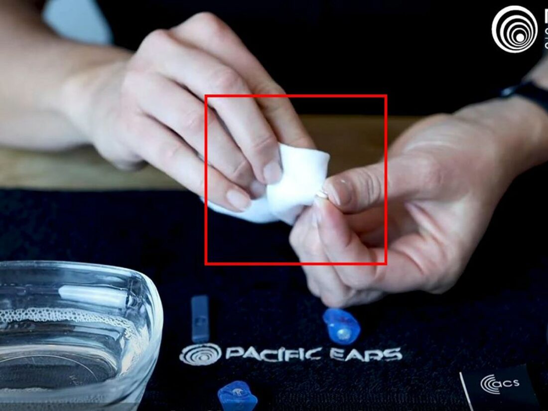 Clean the edges of the filter with a sterile wipe. (From: Youtube/Pacific Ears New Zealand I Info)