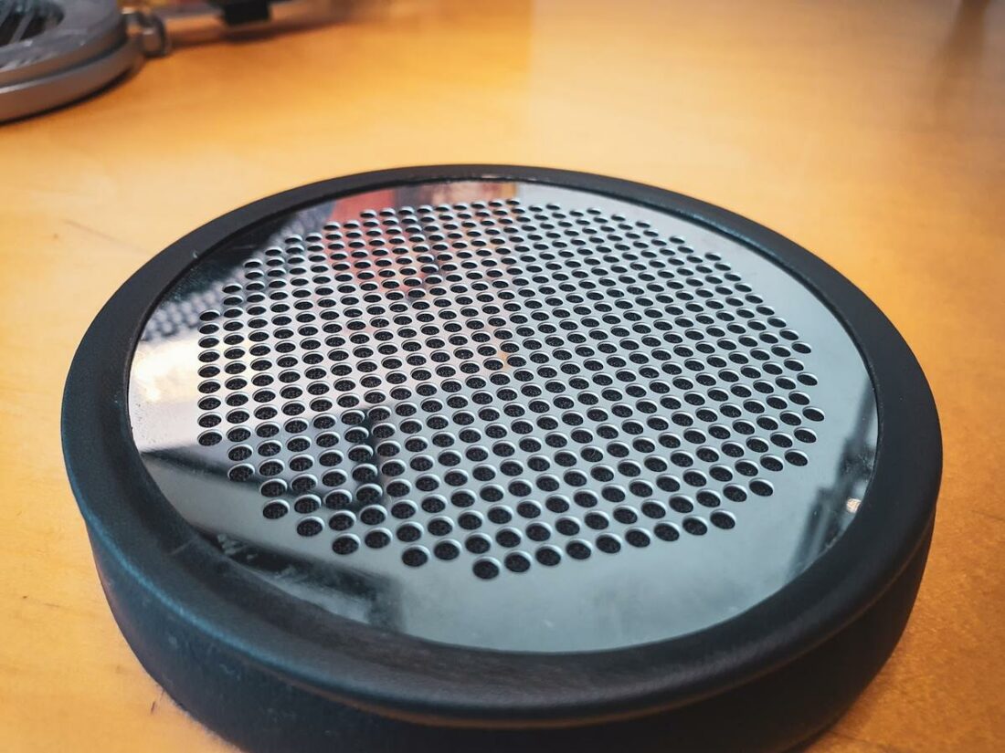 The earpads sit on a glossy steel grill which is a fingerprint magnet.