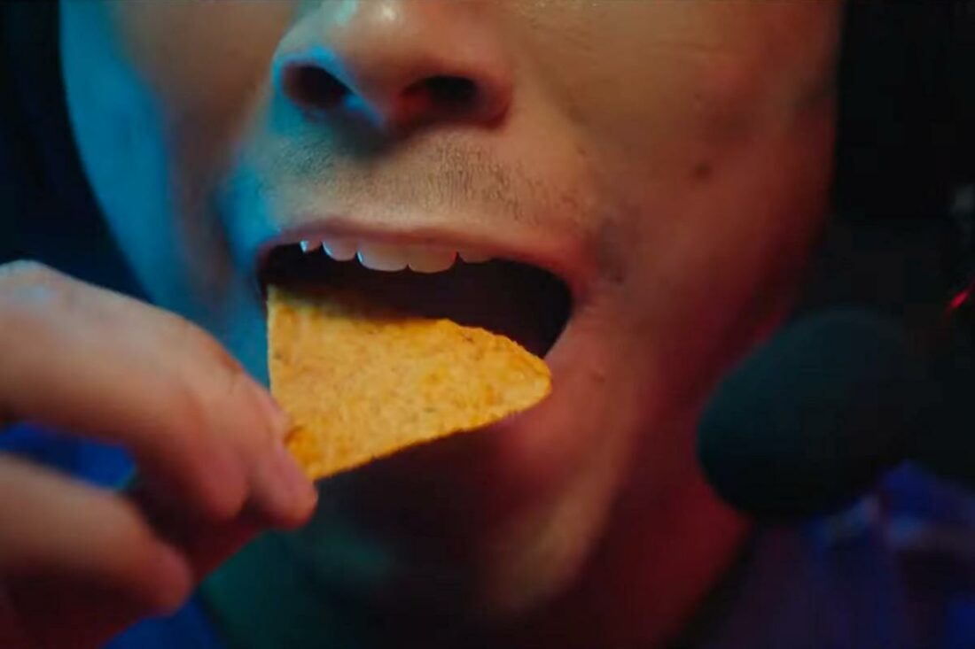 Man eating Doritos. (From: Doritos UK)
