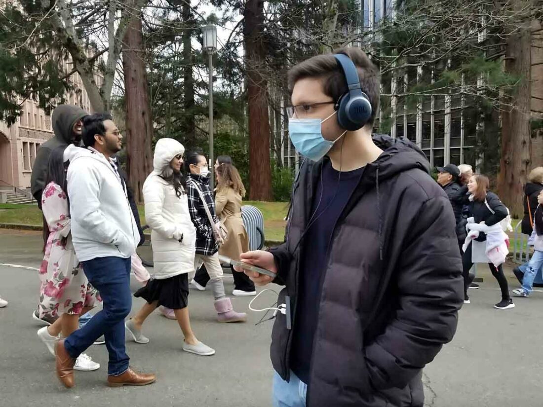 Testing out headphones with the Semantic Hearing Technology on the streets. (From: University of Washington)