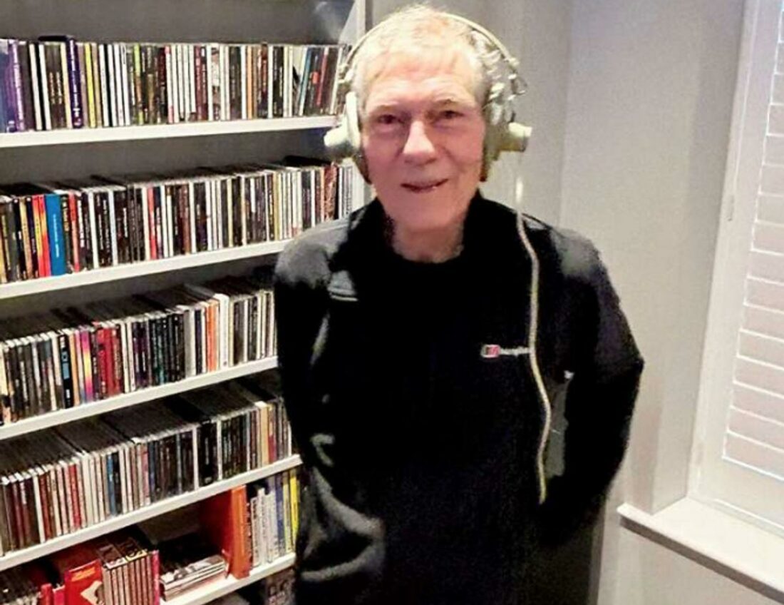 Murray Macauley wearing his Beatles headphones. (From: SWNS)