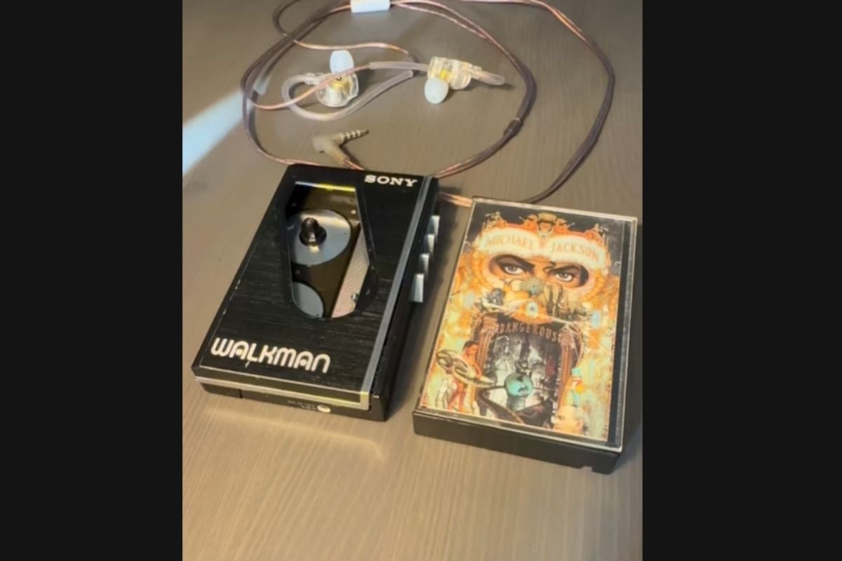 A TikTok video features Dangerous on cassette with a classic Walkman. (From: TikTok/y2ktech_)